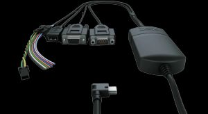A close-up of Geotab IOX Works extensions, showcasing multiple connection ports and cables for integrating peripherals into a telematics system.