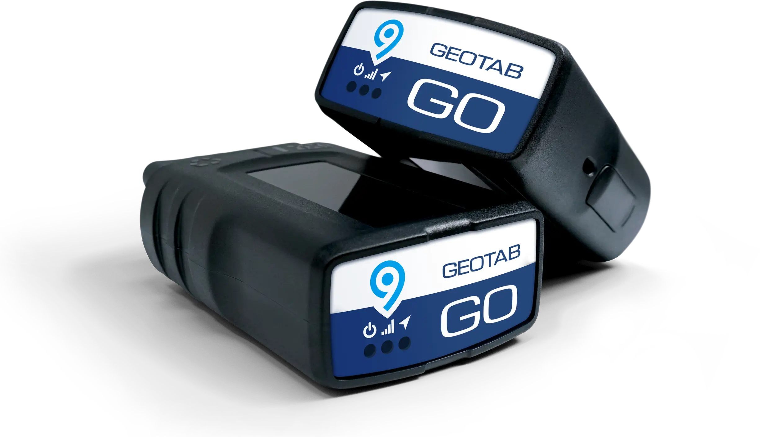 Two Geotab GO devices stacked together, showing the front label which features the Geotab logo and icons representing power, GPS signal, and network connectivity. The devices are compact, black, rectangular units with a glossy surface and are used for vehicle telematics and fleet tracking.